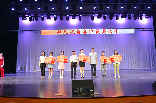 迎接新中国成立七十周年：首届“文华杯”信阳高校大学生公文写作技能竞赛颁奖典礼暨戏曲专场晚会在我校举办